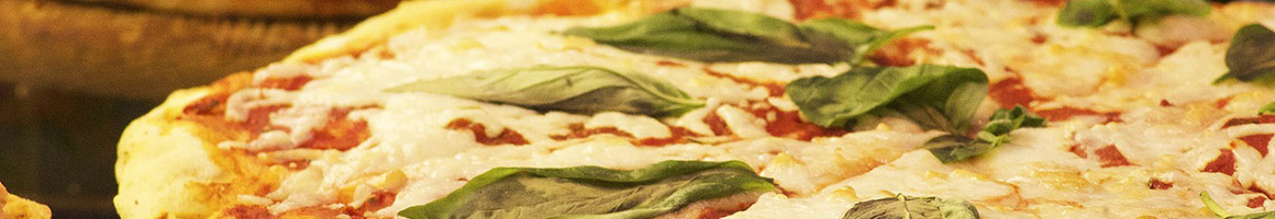Eating Italian Pizza at A Carini's Pizza & Pasta restaurant in Murrieta, CA.